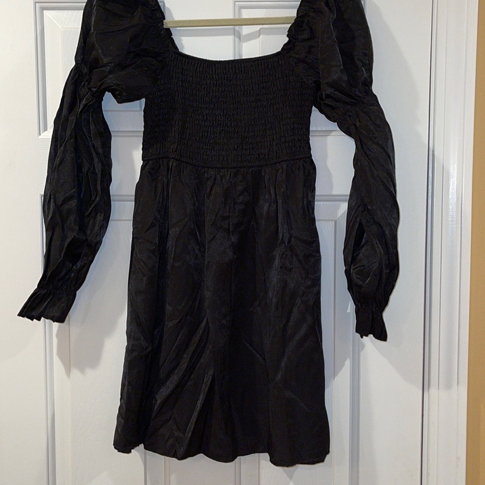 Brand new Shein black long sleeved mini dress.  Size M.